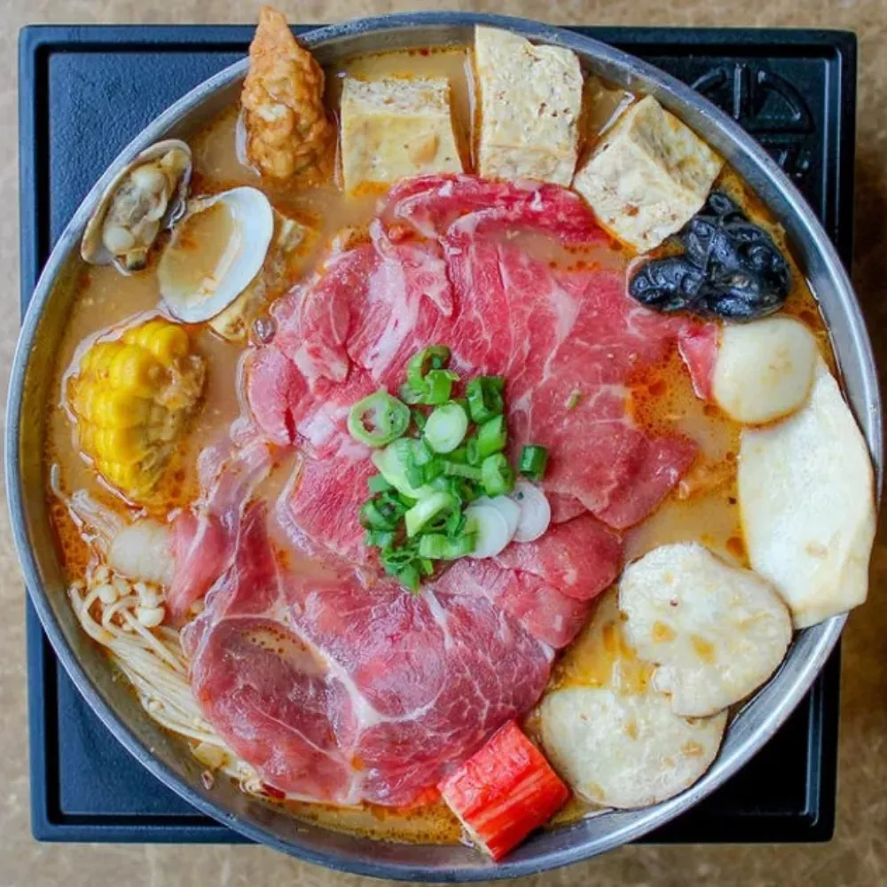 Beef and seafood hot pot with tofu and mushrooms at Uniboil Phresh Teas Co, a Hot Pot Restaurant in Goleta.