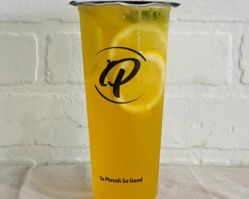 Zesty lemon iced tea with fresh lemon slices at Uniboil Phresh Teas Co, a Hot Pot Restaurant in Goleta.