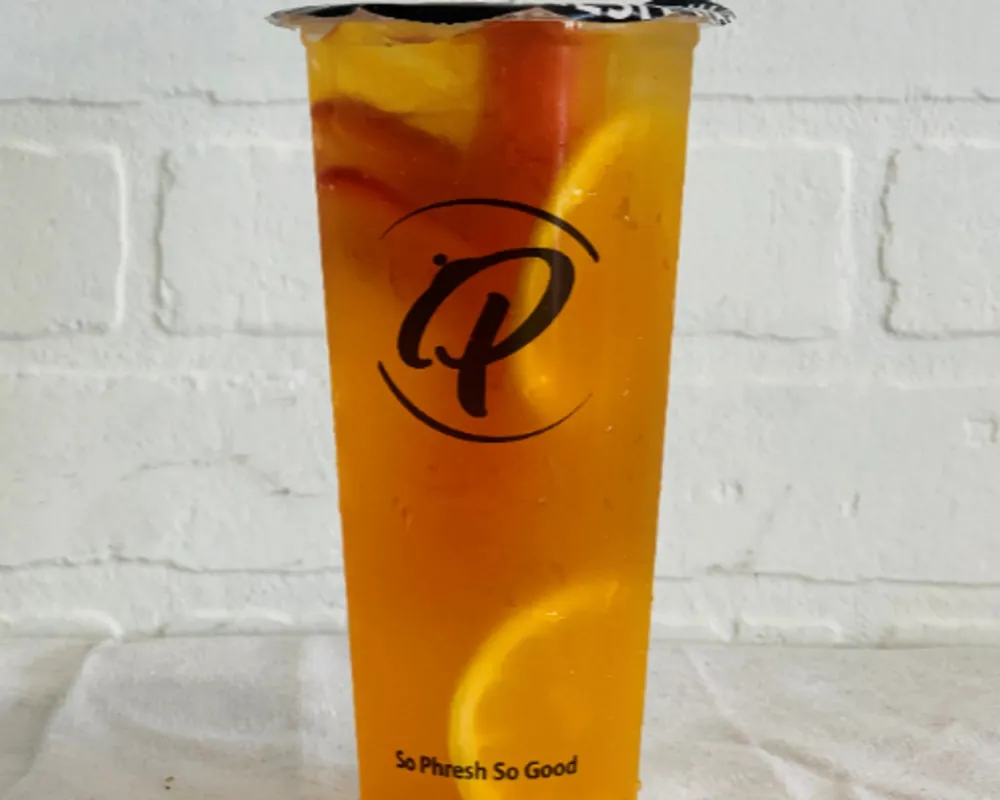 Mixed fruit iced tea with fresh fruit chunks at Uniboil Phresh Teas Co, a Hot Pot Restaurant in Goleta.